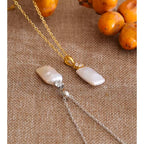 Collier carré avec perle baroque et zirconium