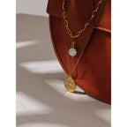 Collier Étoile du Nord superposable doré avec pendentif perlé