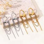 Boucles pendantes sculpturale dorée