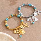 Bracelet charms turquoise croix doré plaqué or