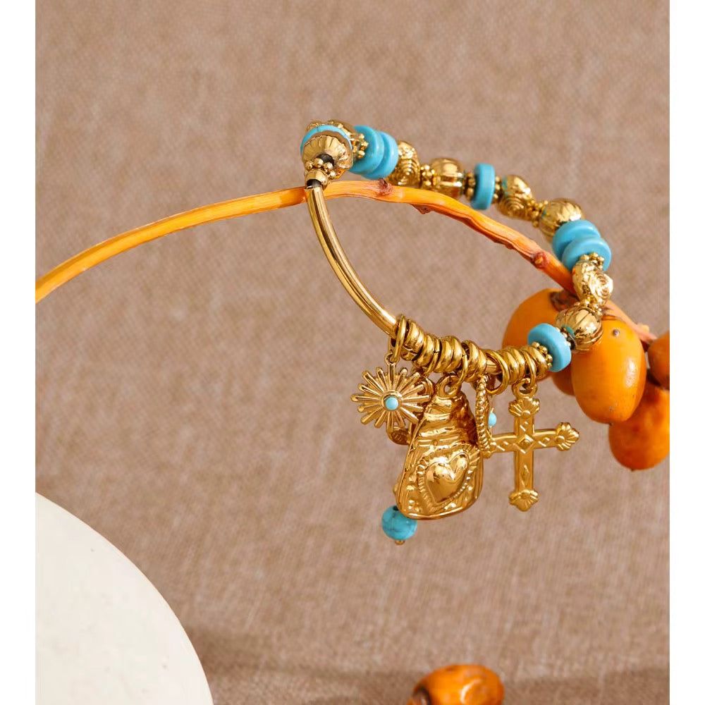 Bracelet charms turquoise croix doré plaqué or