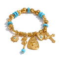 Bracelet charms turquoise croix doré plaqué or